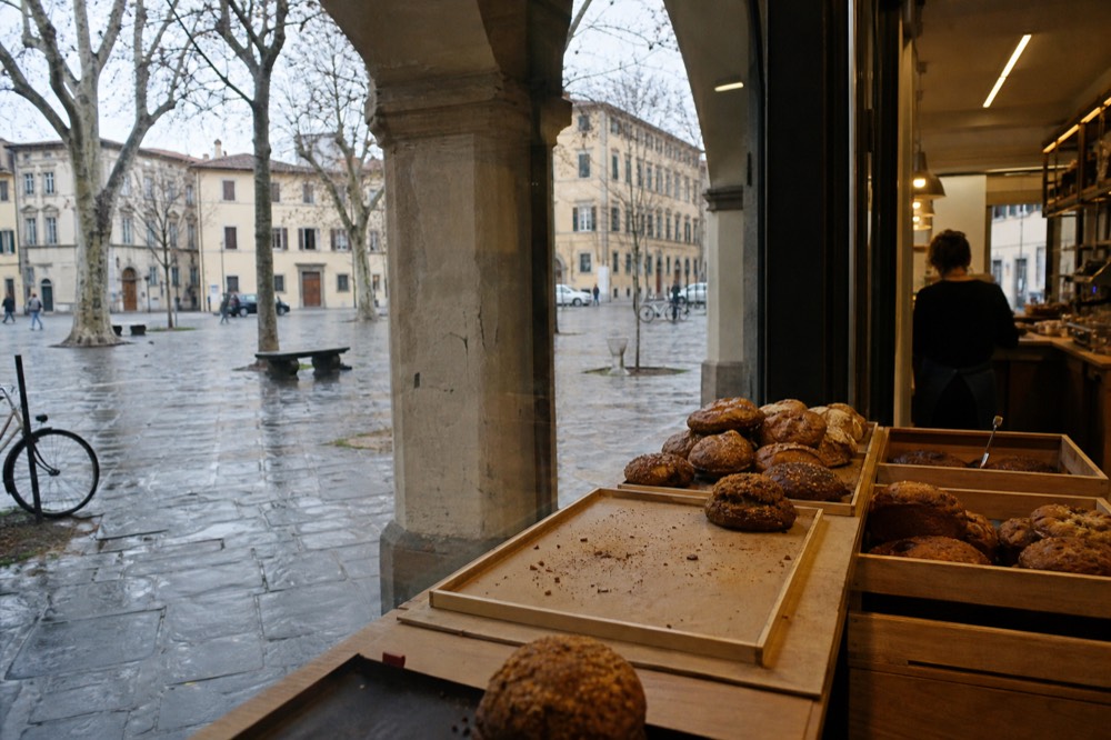 A display of gluten-free bread and pastries at a Florence bakery